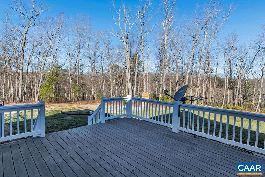 7920 Chestnut Grove Road Esmont, VA 22937 - Photo 31 of 34 a view of backyard with deck and wooden floor