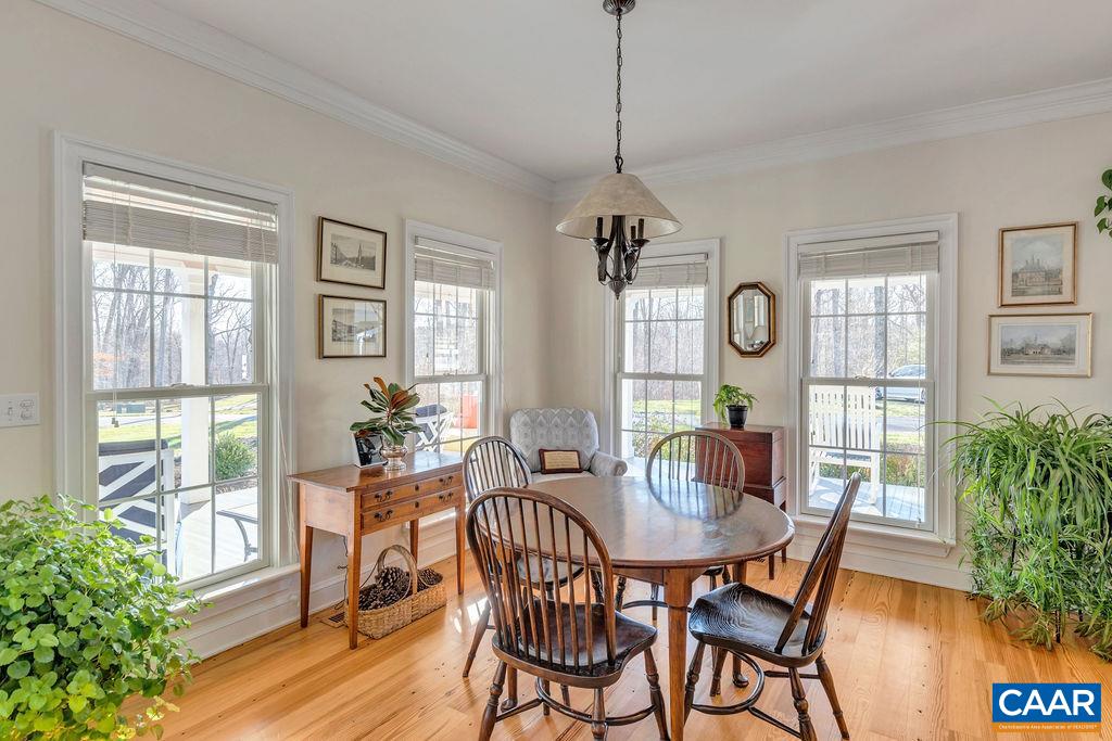 7920 Chestnut Grove Road Esmont, VA 22937 - Photo 8 of 34 a view of a dining room with furniture window and wooden floor