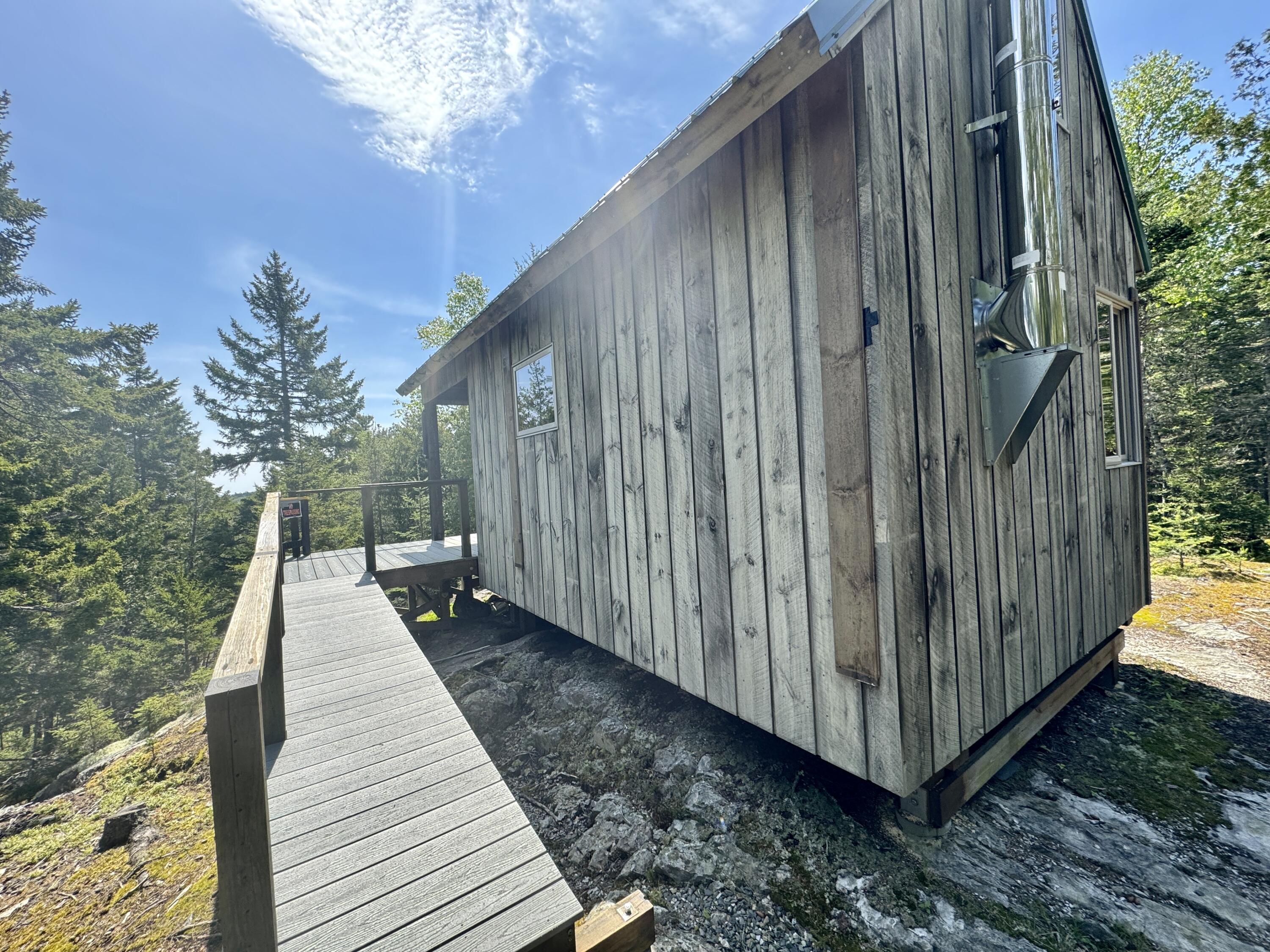 998 Cape Rosier Road Harborside, ME 04642 - Photo 14 of 42 Side View of Cabin