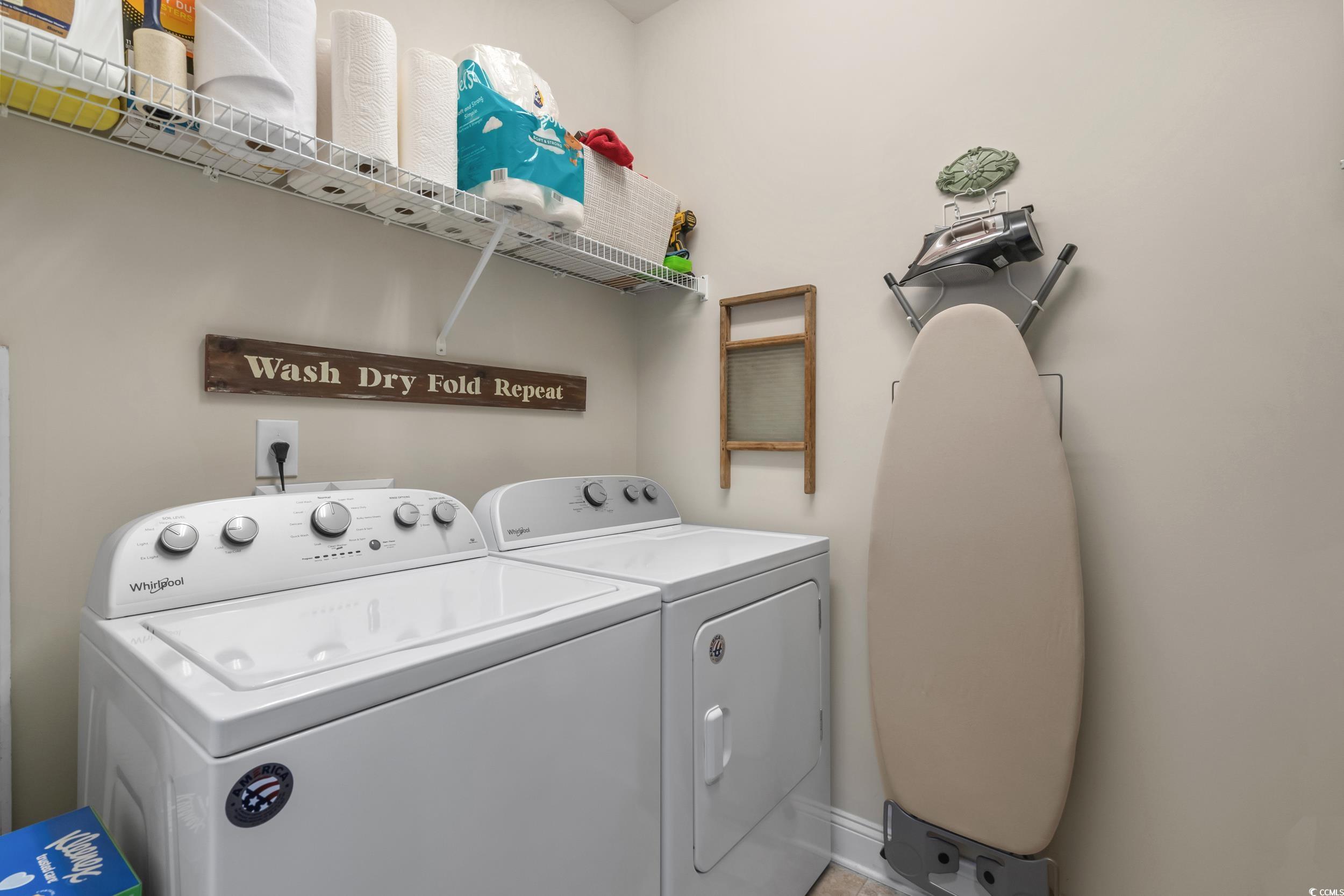 142 Ella Kinley Circle, Unit 304 Myrtle Beach, SC 29588 - Photo 30 of 38 Washroom with washer and dryer