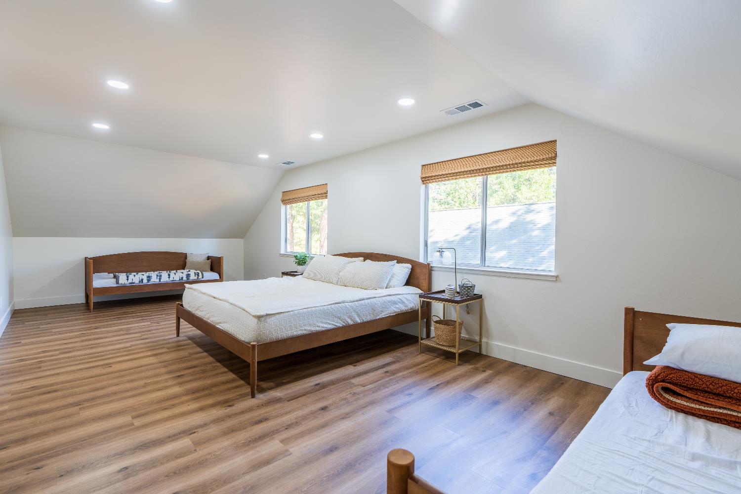 28960 Snowhite Ridge Drive Long Barn, CA 95335 - Photo 11 of 15 a bedroom with a bed and a window