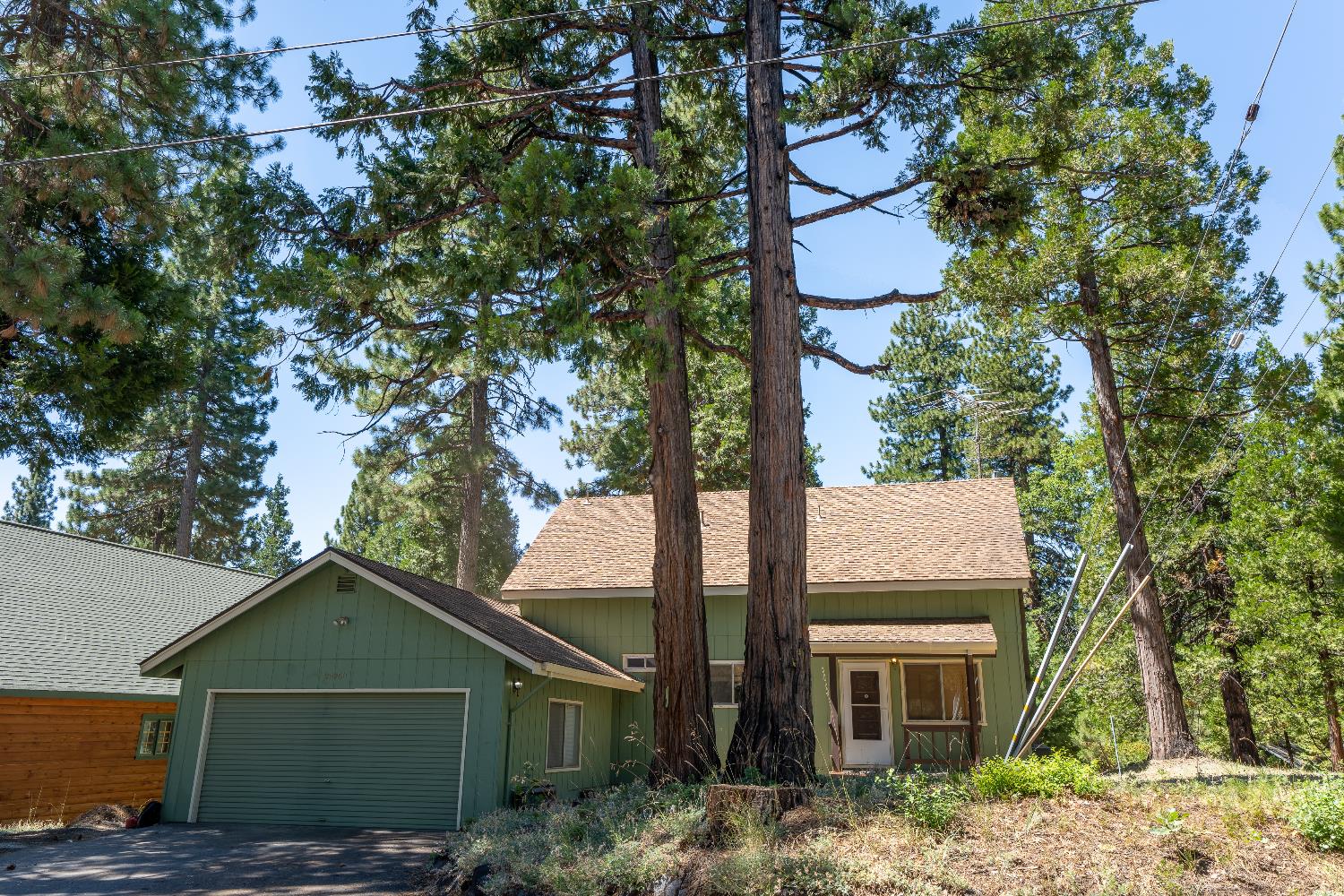 28960 Snowhite Ridge Drive Long Barn, CA 95335 - Photo 15 of 15 a view of house with a tree