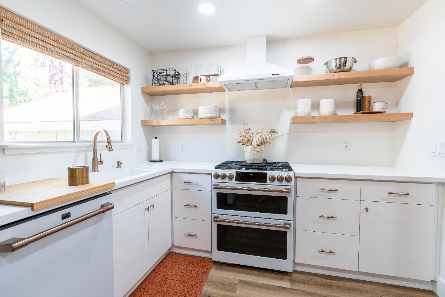 28960 Snowhite Ridge Drive Long Barn, CA 95335 - Photo 6 of 15 a kitchen with cabinets a stove and wooden floor
