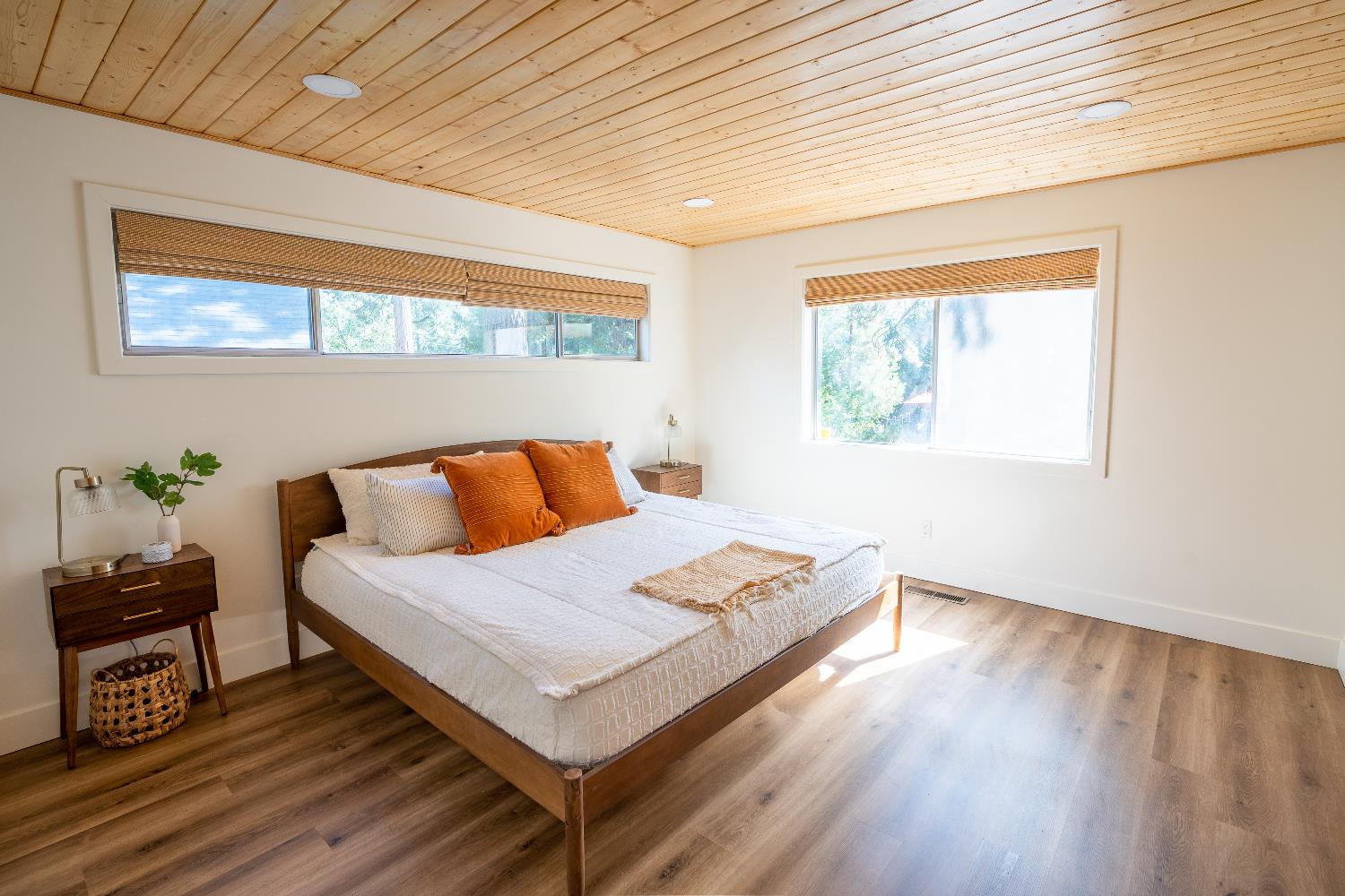 28960 Snowhite Ridge Drive Long Barn, CA 95335 - Photo 8 of 15 a bedroom with a bed and wooden floor