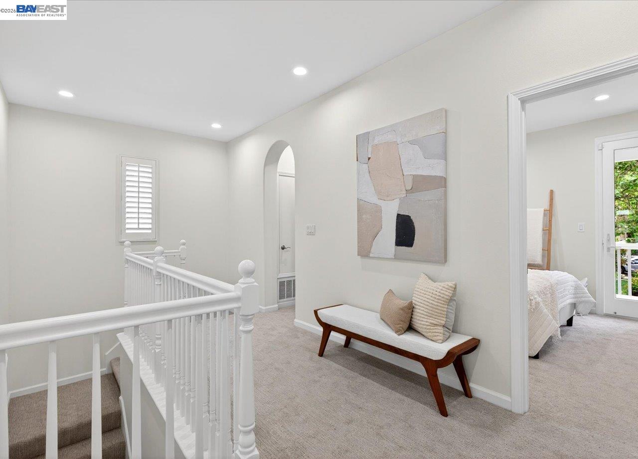 8148 Briar Oaks Drive San Ramon, CA 94582 - Photo 23 of 40 a spacious bedroom with a bed and a window