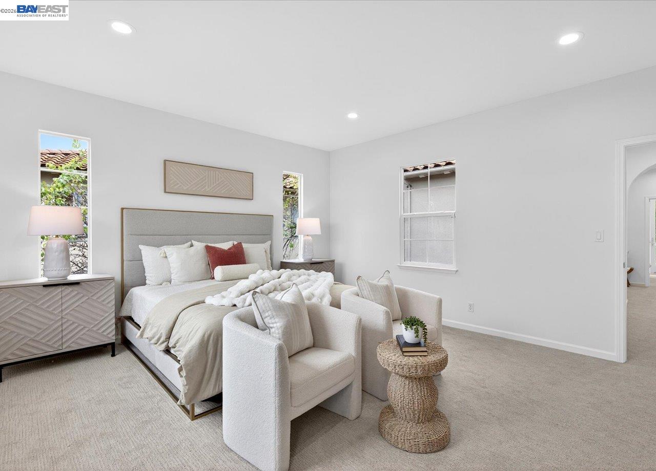 8148 Briar Oaks Drive San Ramon, CA 94582 - Photo 25 of 40 a bedroom with a bed and white walls