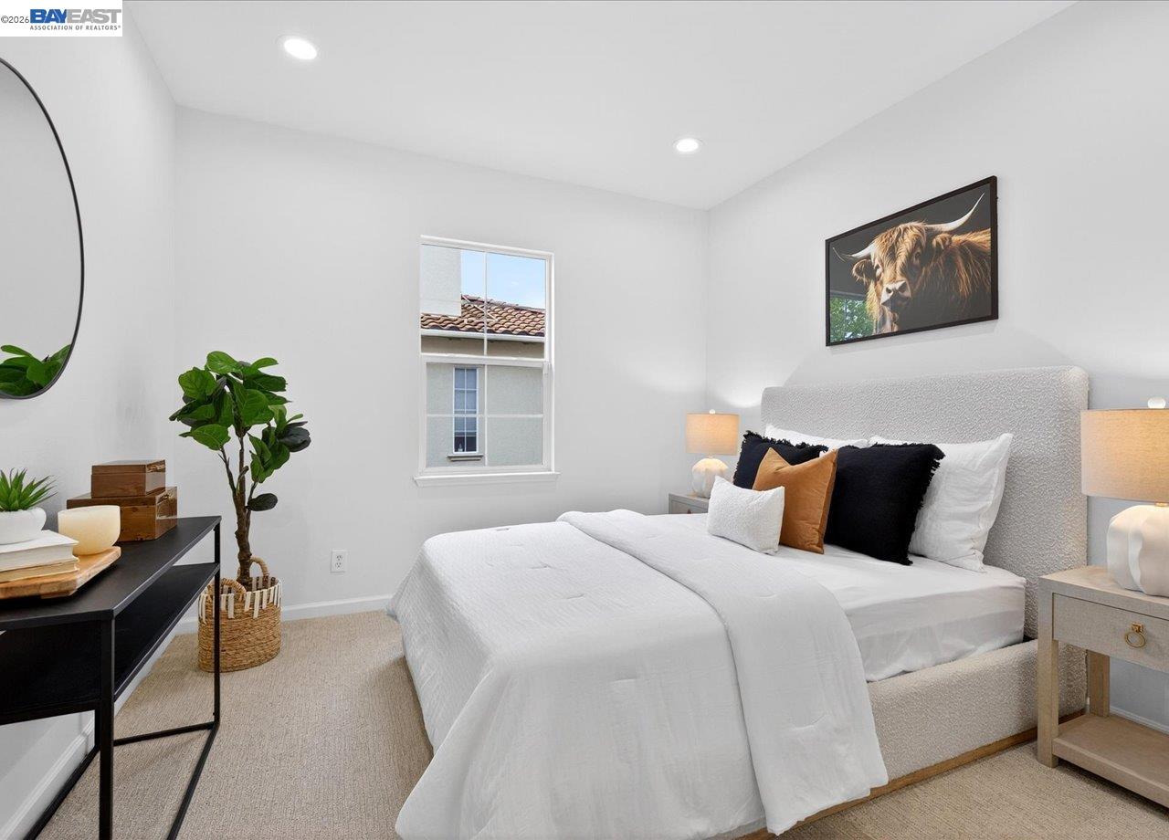 8148 Briar Oaks Drive San Ramon, CA 94582 - Photo 33 of 40 a bedroom with a bed and a potted plant