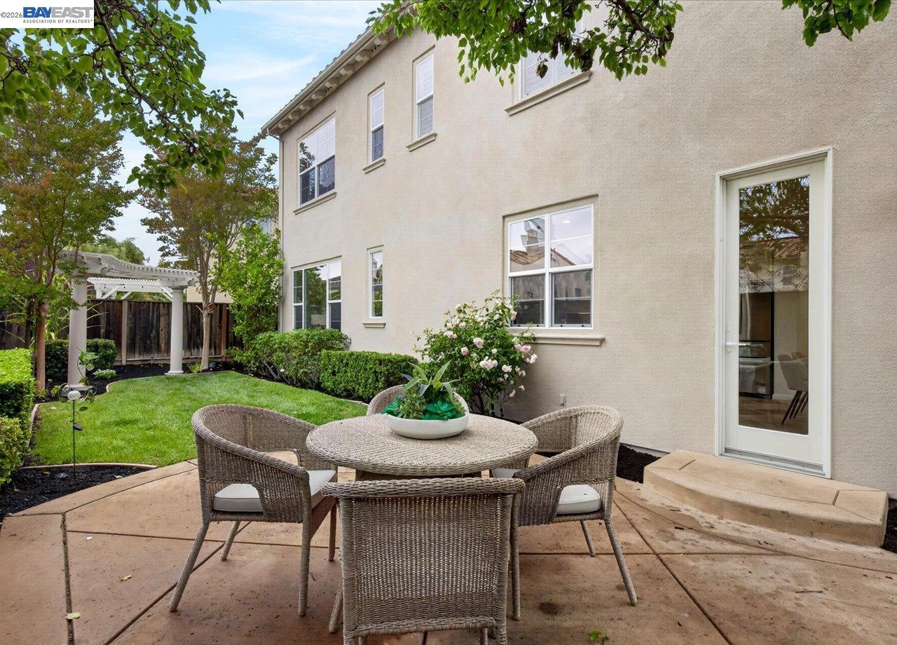8148 Briar Oaks Drive San Ramon, CA 94582 - Photo 36 of 40 a view of a house with a backyard and a sitting area