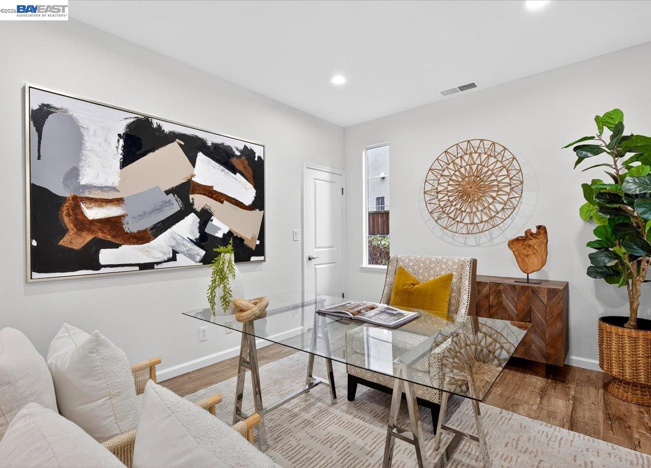 8148 Briar Oaks Drive San Ramon, CA 94582 - Photo 6 of 40 a living room with furniture and wall paintings