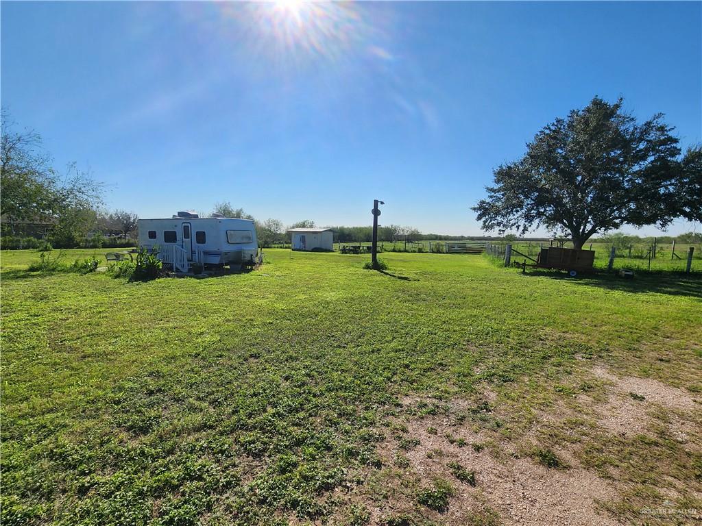 8569 Charles Green Road Edcouch, TX 78538 - Photo 11 of 22 a view of a field with a tree in front of it