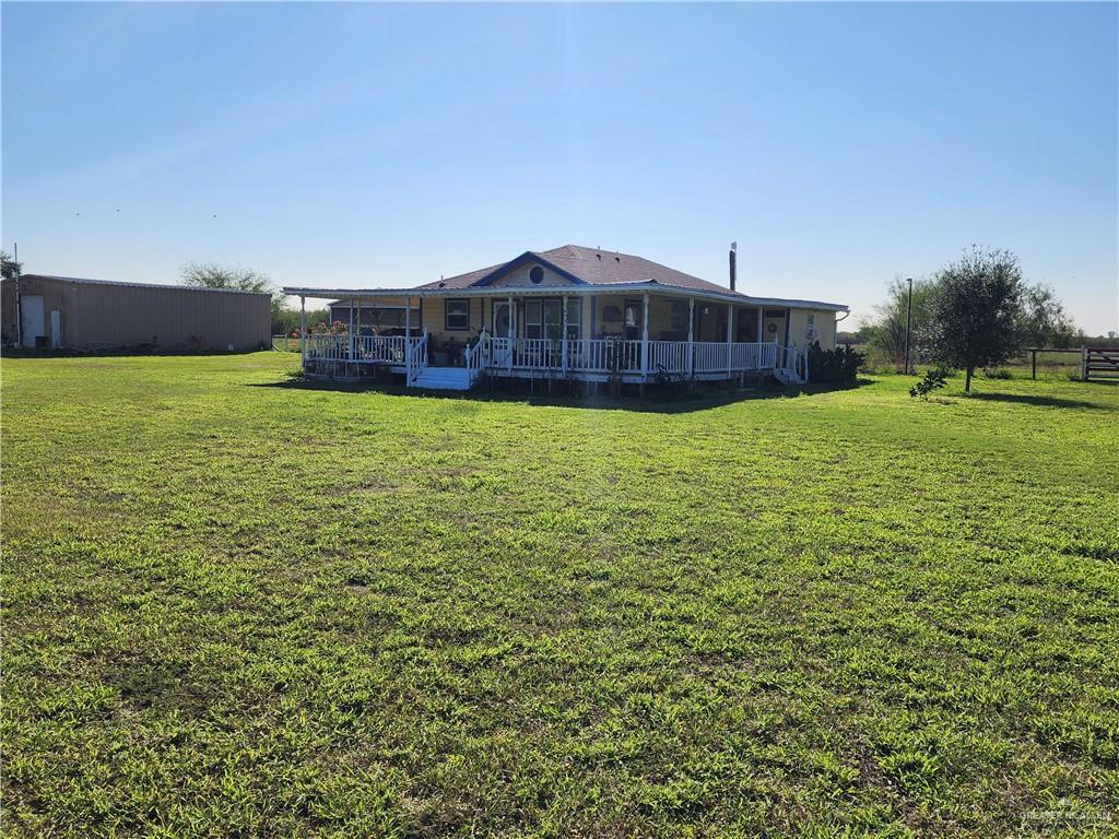 8569 Charles Green Road Edcouch, TX 78538 - Photo 5 of 22 a house view with a outdoor space