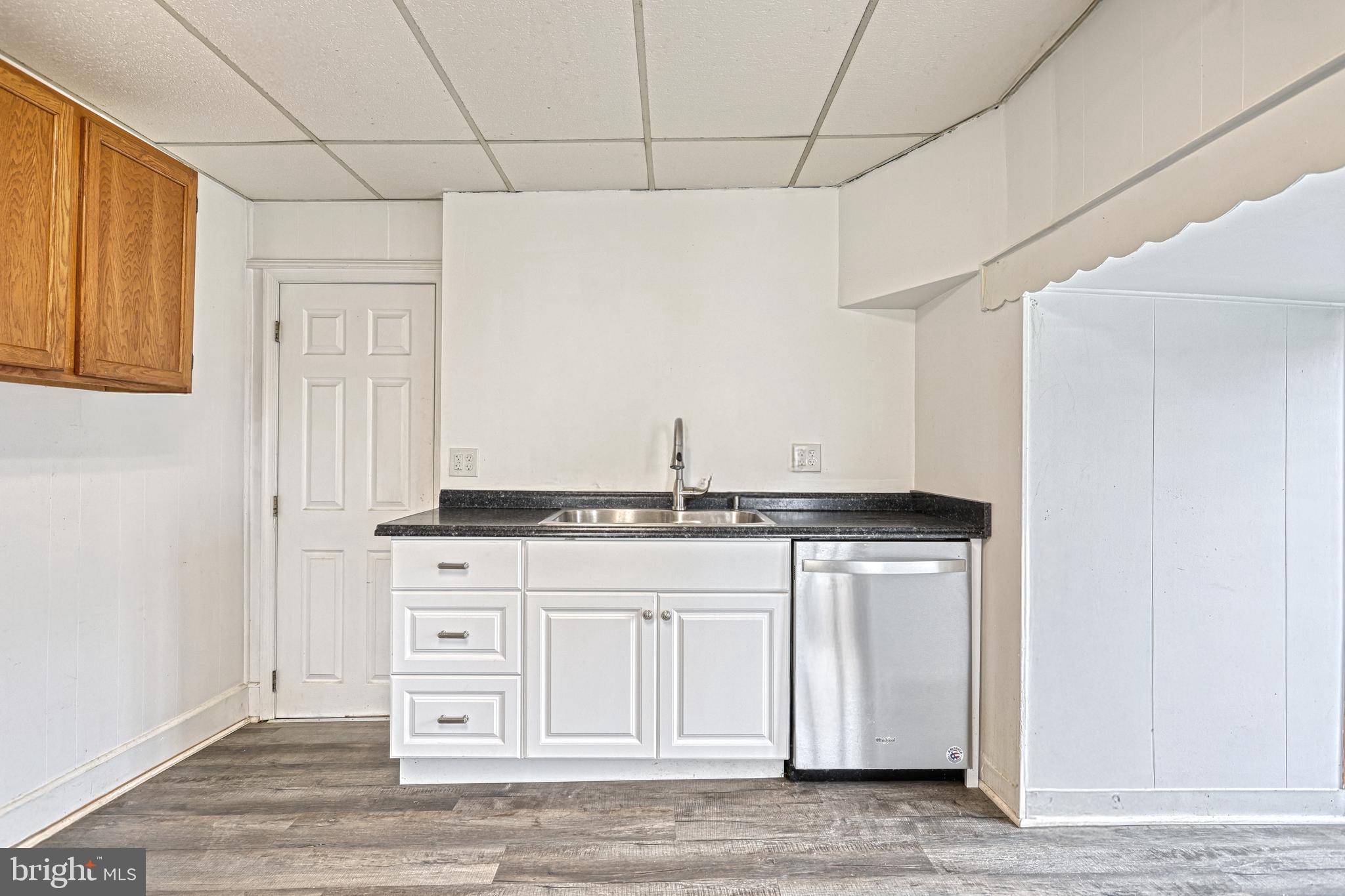 3 North Water Street Spring Grove, PA 17362 - Photo 20 of 52 a kitchen with stainless steel appliances granite countertop a sink and cabinets