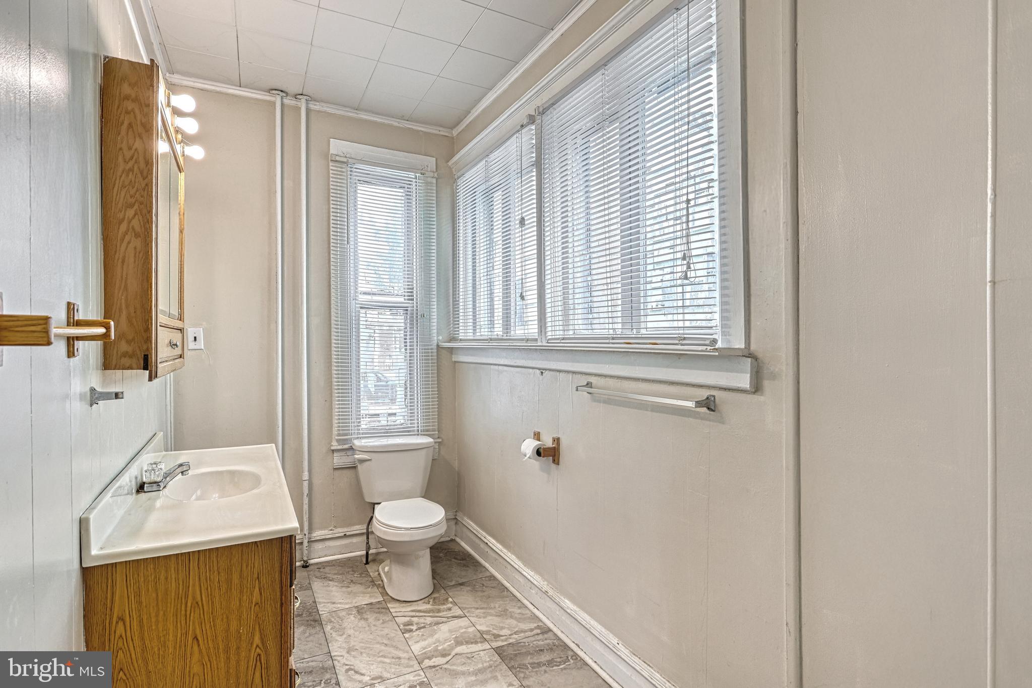 3 North Water Street Spring Grove, PA 17362 - Photo 23 of 52 a bathroom with a sink toilet and shower