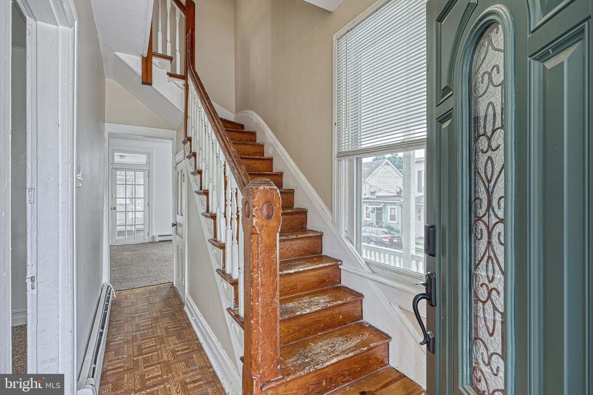 3 North Water Street Spring Grove, PA 17362 - Photo 9 of 52 a view of a hallway with wooden floor and entryway