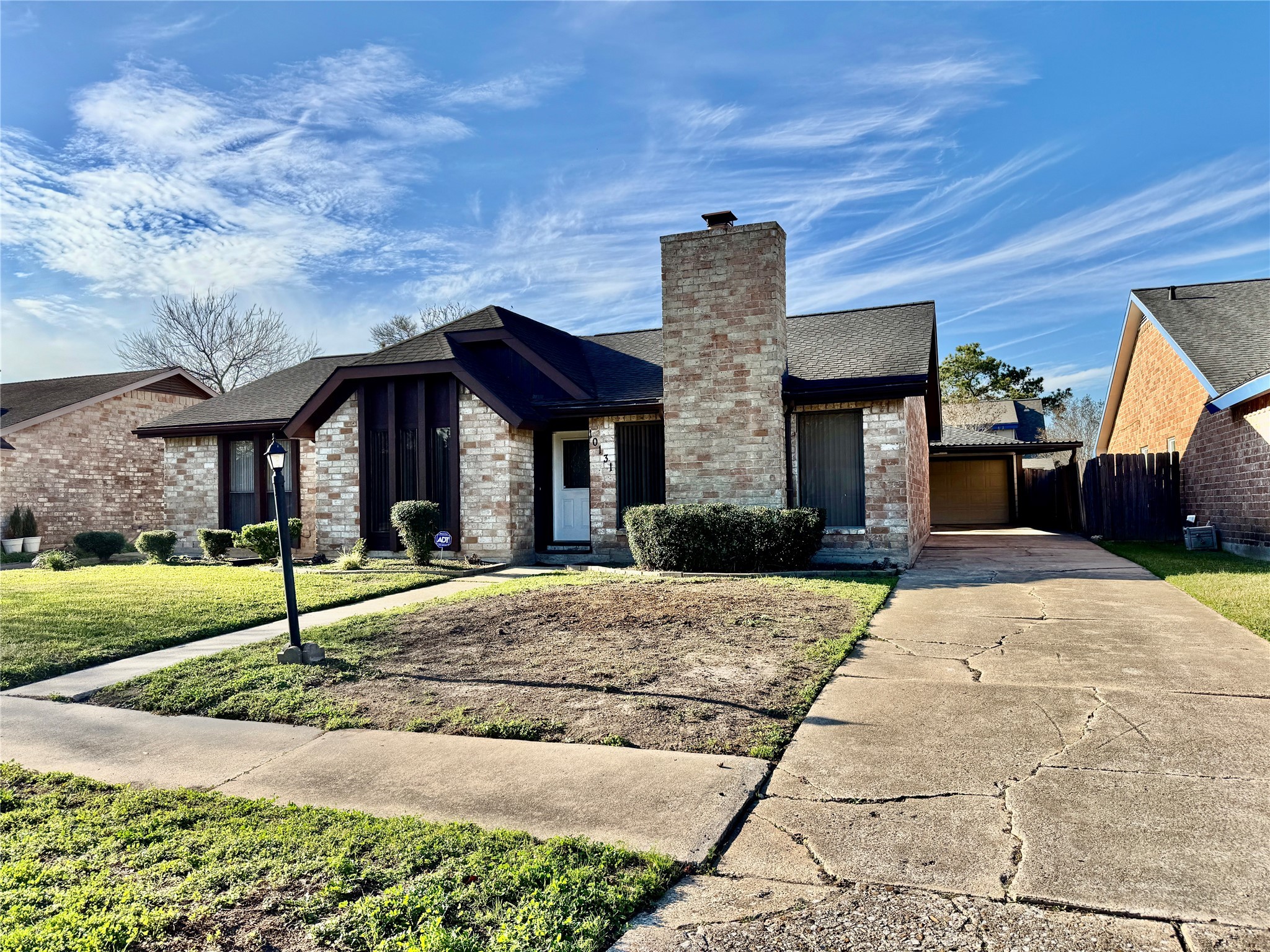 10131 Sagedale Drive Houston, TX 77089 - Photo 2 of 21 a house with yard in front of it