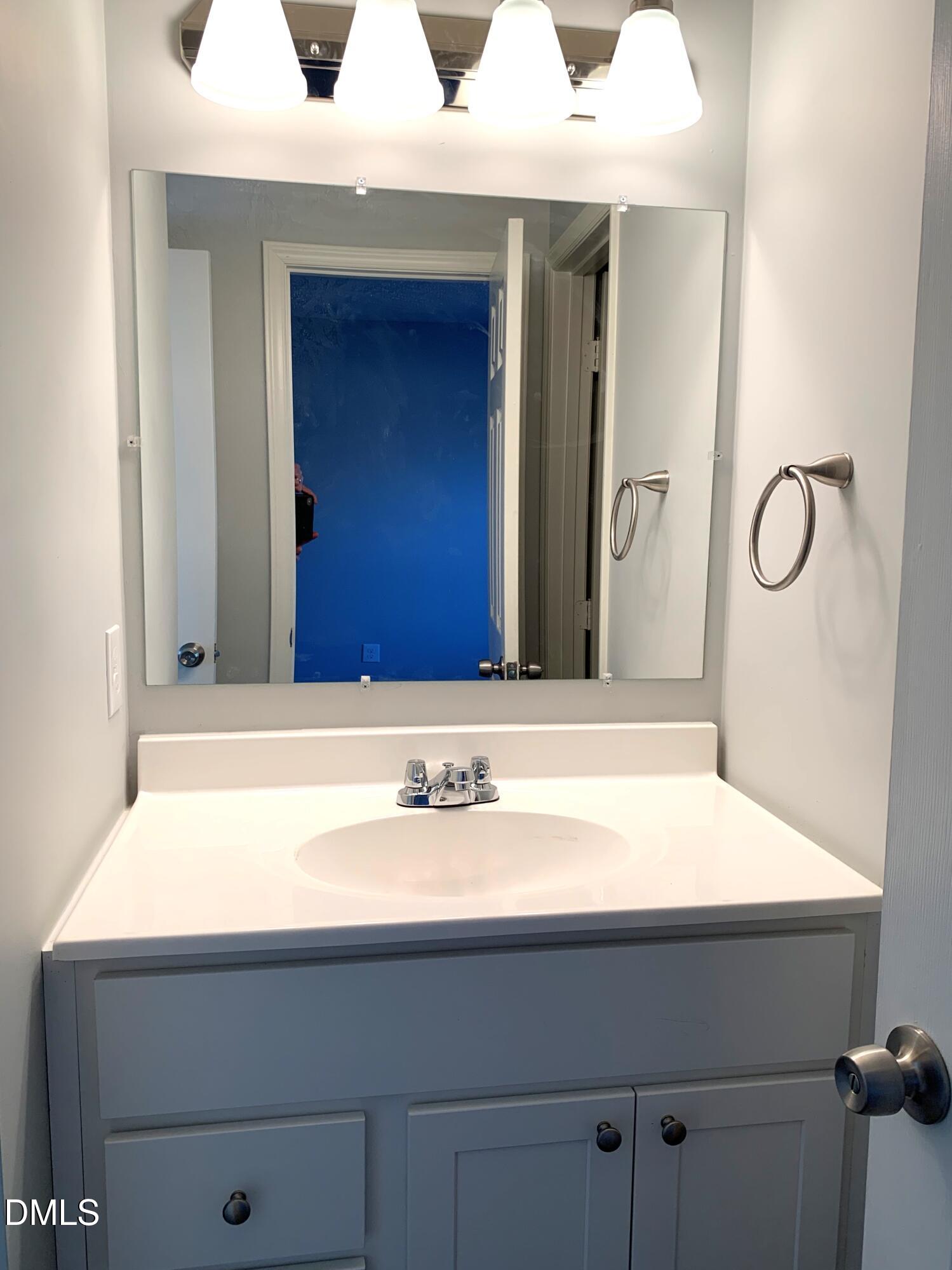 5533 Kaplan Drive, Unit A Raleigh, NC 27606 - Photo 11 of 12 5533 Kaplan Vanity