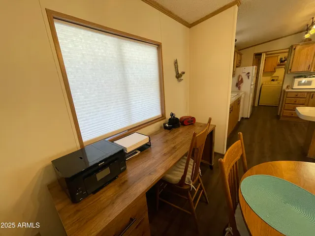 view of a room with chair and table