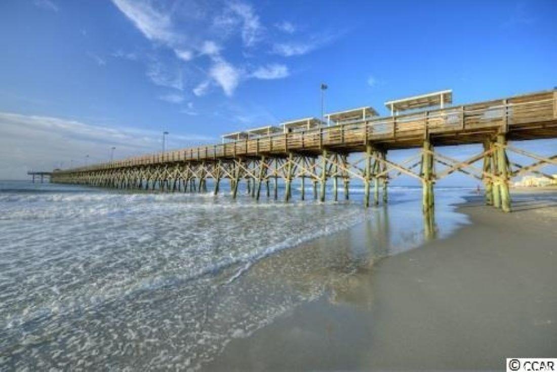 414 36th Avenue North Myrtle Beach, SC 29577 - Photo 21 of 22 Dock area featuring a pier and a water view