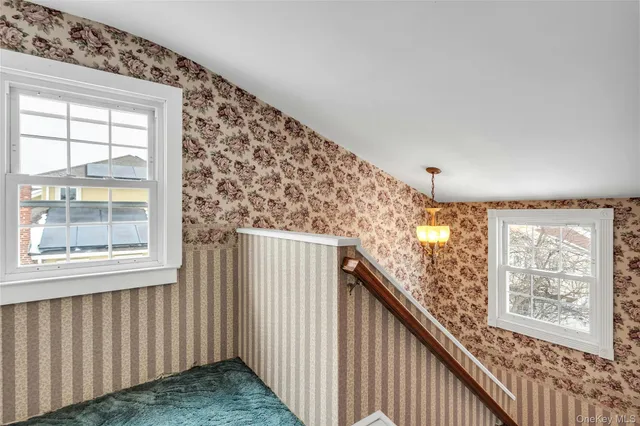 a view of balcony with wooden floor