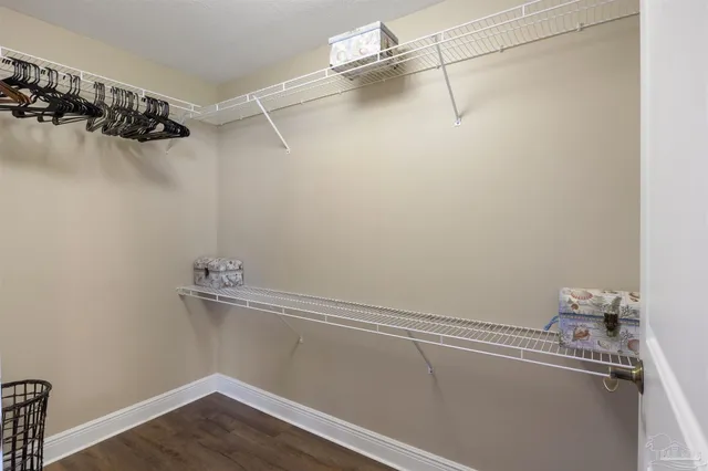 a view of a room with racks on the wall