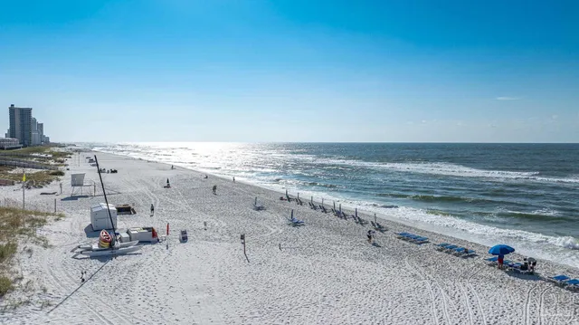 a view of a chairs and tables in patio