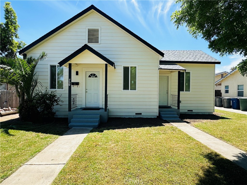 730 West 23rd Street Merced, CA 95340 - Photo 1 of 1 a front view of house with yard