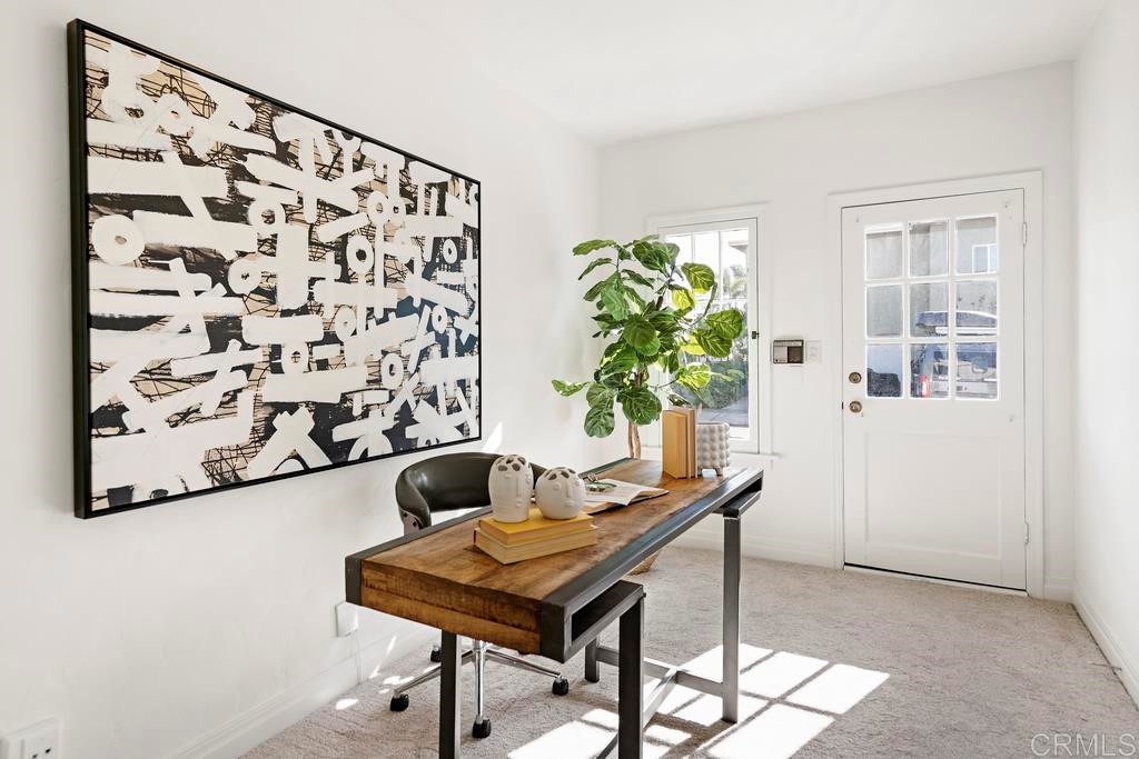304 La Veta Avenue Encinitas, CA 92024 - Photo 8 of 14 a living room with furniture and a potted plant