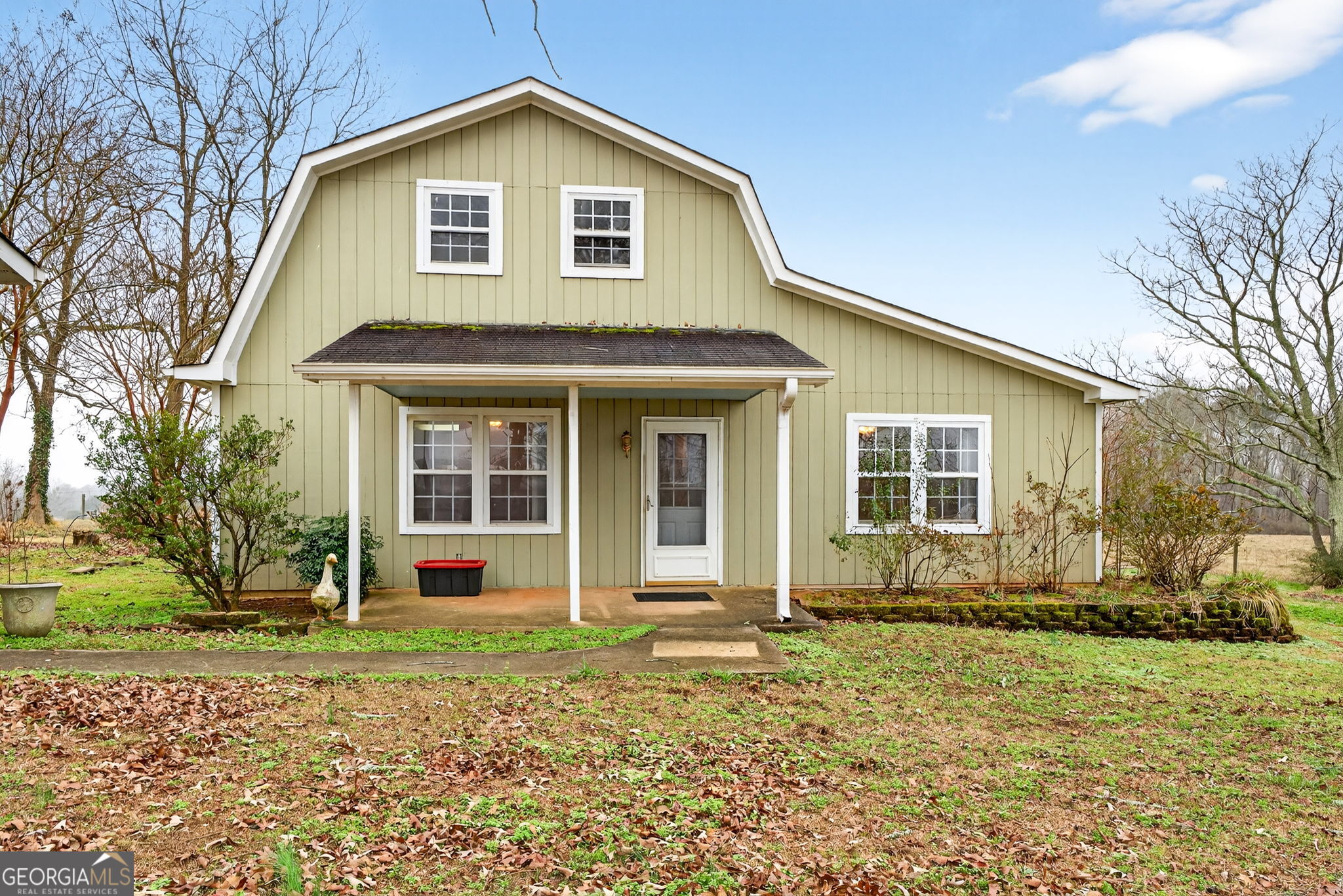 402 Tom Bell Road Milner, GA 30257 - Photo 52 of 75 a front view of a house with a yard