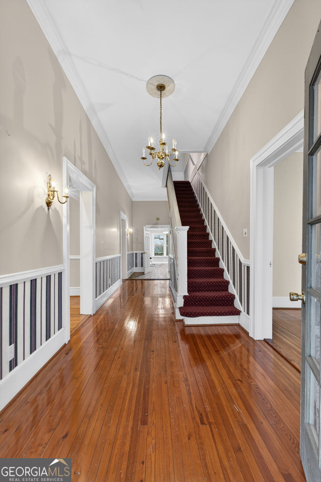 402 Tom Bell Road Milner, GA 30257 - Photo 7 of 75 a view of entryway and hall with wooden floor
