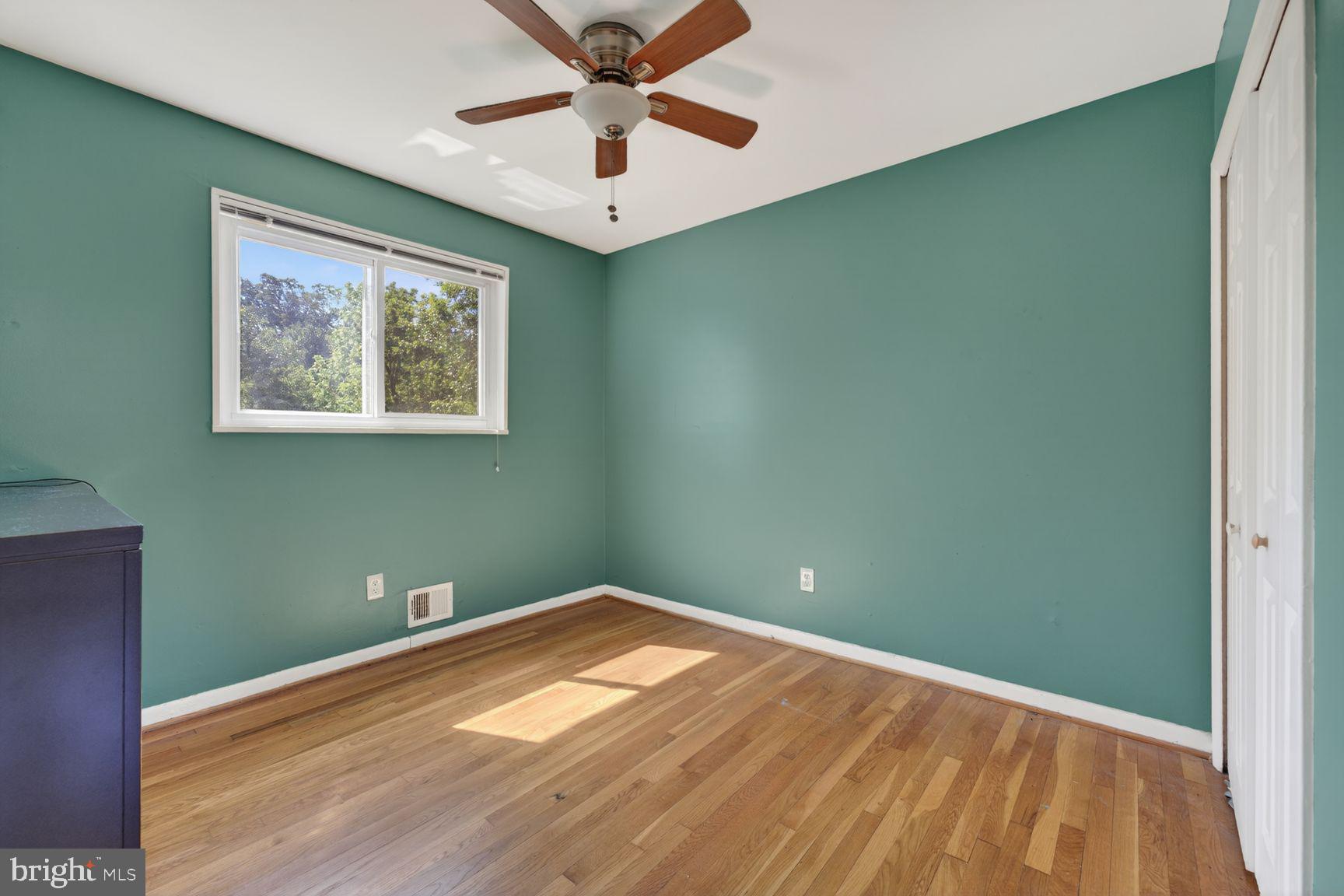 1104 Caddington Avenue Silver Spring, MD 20901 - Photo 16 of 35 a view of empty room with wooden floor