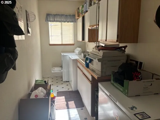 a bathroom with a sink mirror and window