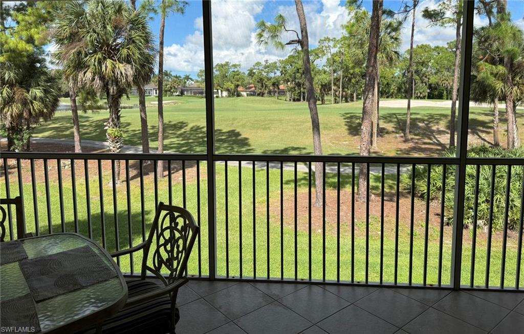 8165 Celeste Drive, Unit 2228 Naples, FL 34113 - Photo 25 of 30 a view of a balcony with lake view