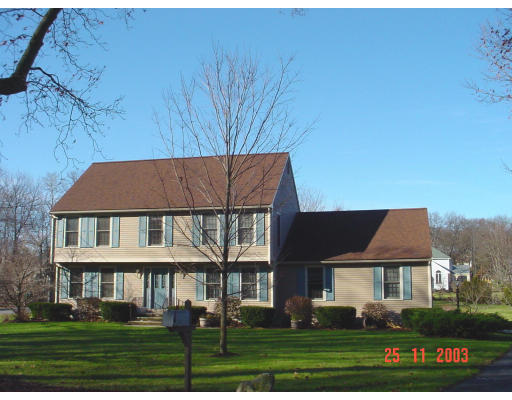 66 Higley Road Ashland, MA 01721 - Photo 1 of 1 a front view of a house with a yard