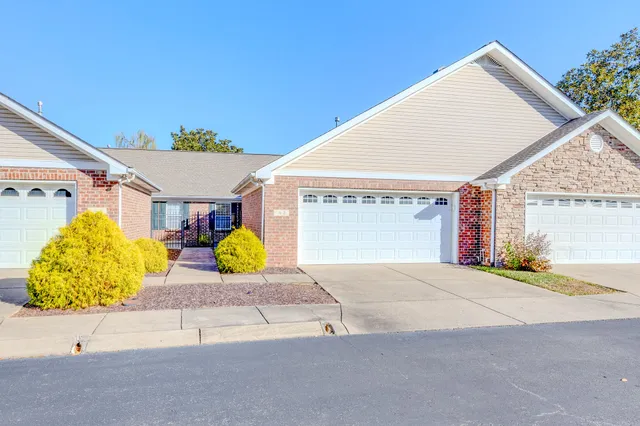 a view of outdoor space and front view of a house