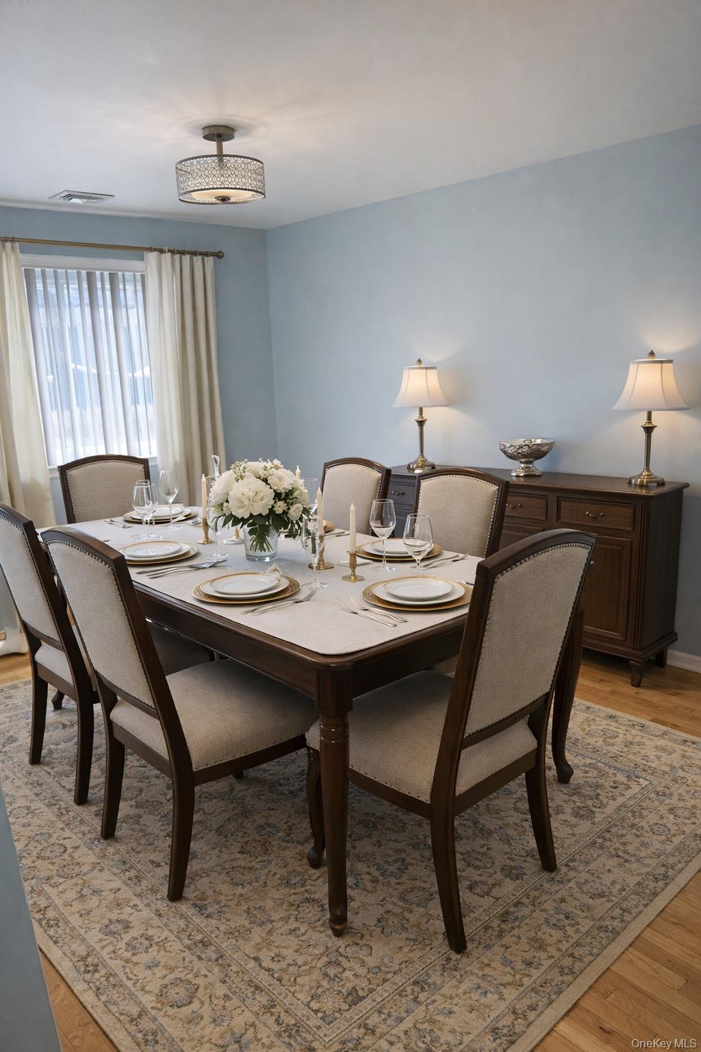88 East Valley Stream Boulevard, Unit 9 Valley Stream, NY 11580 - Photo 6 of 17 a view of a dining room with furniture and window