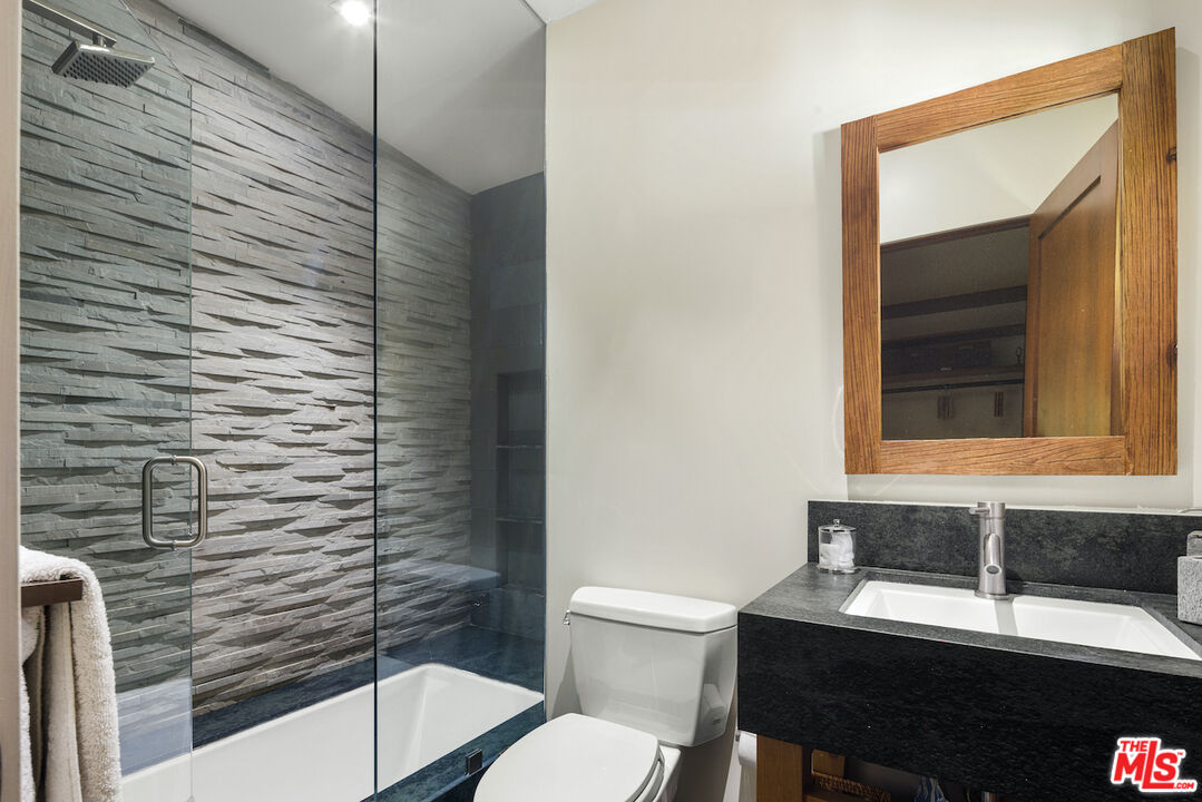 473 West Rustic Road Santa Monica, CA 90402 - Photo 16 of 25 a bathroom with a sink and a toilet