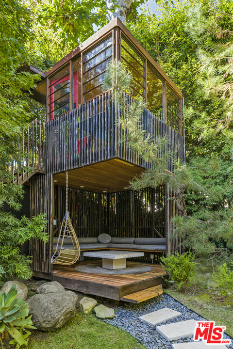 473 West Rustic Road Santa Monica, CA 90402 - Photo 18 of 25 a view of a house with a yard