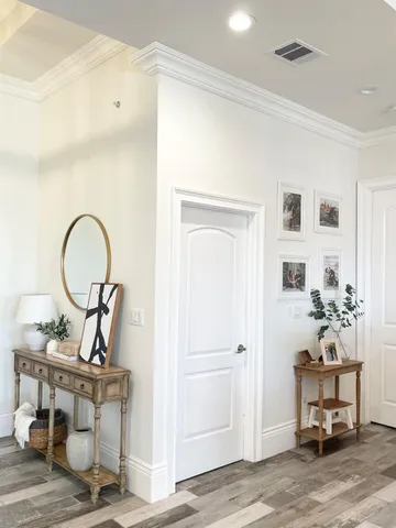 a view of a workspace area with furniture