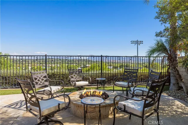 a view of a balcony with chairs