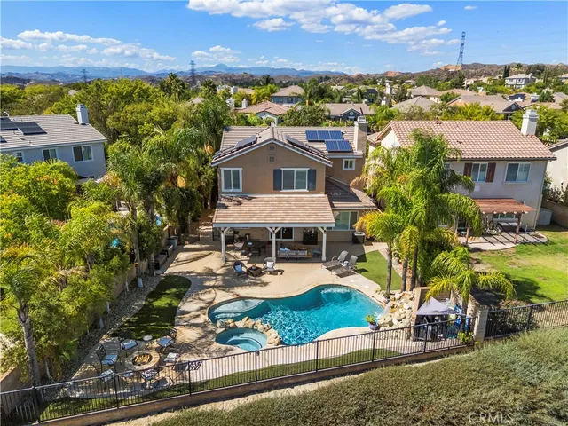 an aerial view of a house with a garden