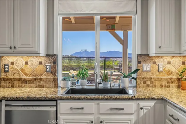 a counter top with a granite countertop cabinets