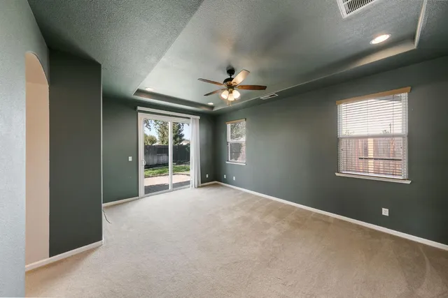 a view of a livingroom with a ceiling fan