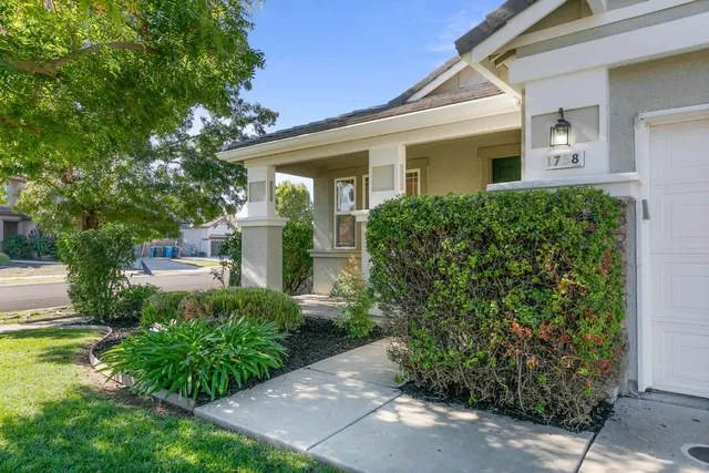 a view of a house with a garden