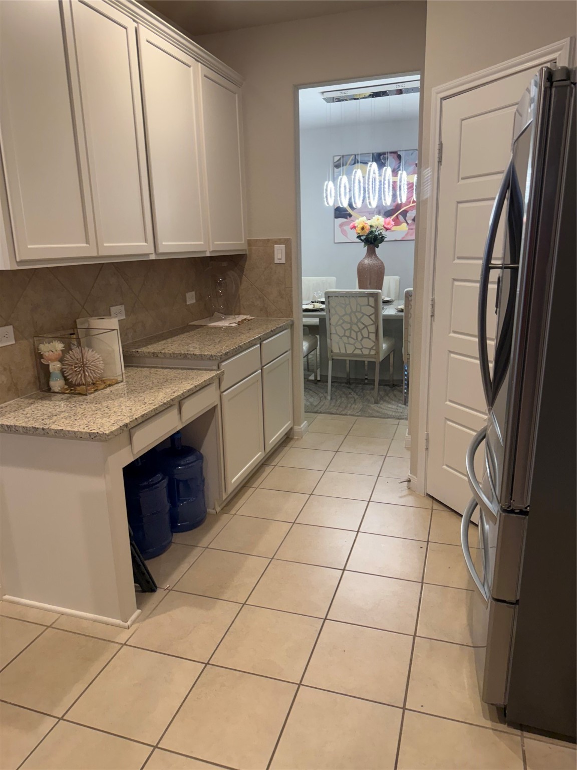 1617 Darwin Cedar Drive Rosharon, TX 77583 - Photo 16 of 27 a kitchen with stainless steel appliances granite countertop a refrigerator sink and cabinets