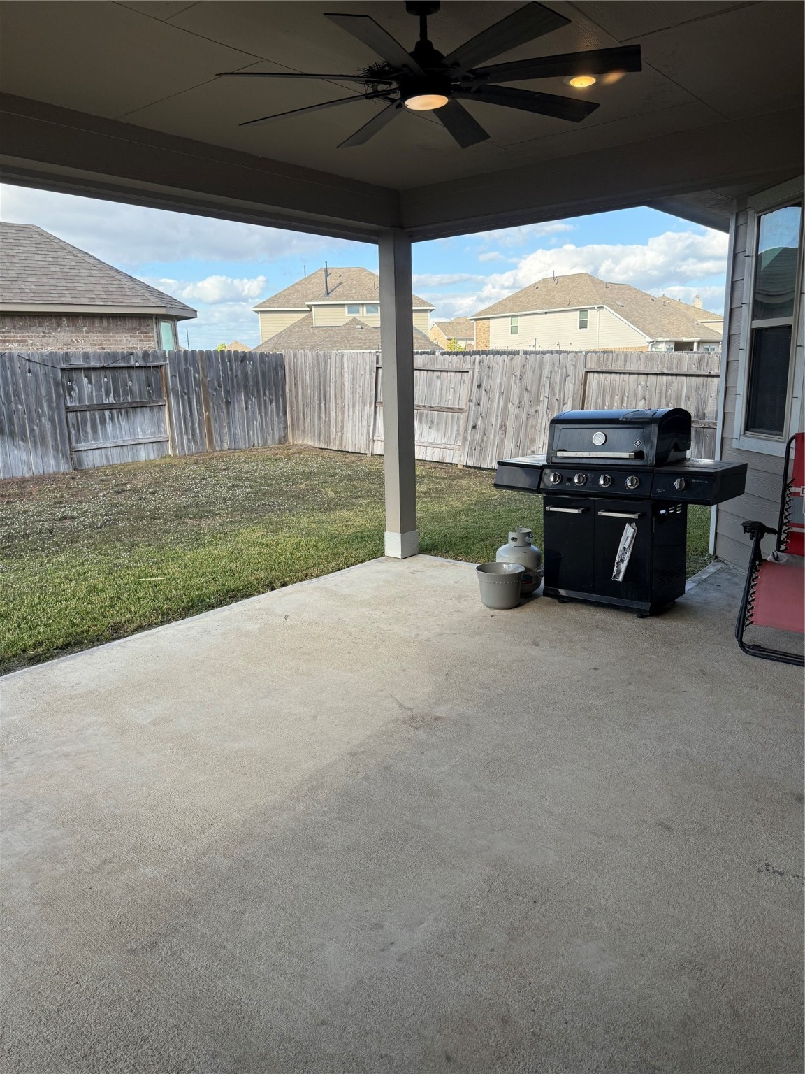 1617 Darwin Cedar Drive Rosharon, TX 77583 - Photo 27 of 27 a view of a porch with furniture and floor to ceiling window