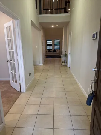 a view of a hallway with entryway