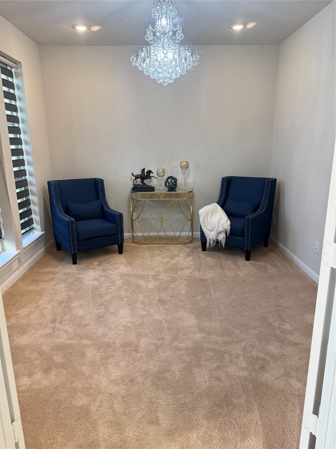 1617 Darwin Cedar Drive Rosharon, TX 77583 - Photo 8 of 27 a living room with furniture and a chandelier