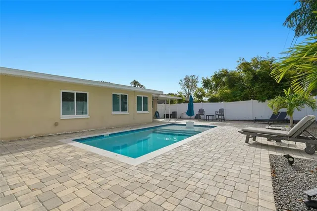a view of outdoor space yard and swimming pool