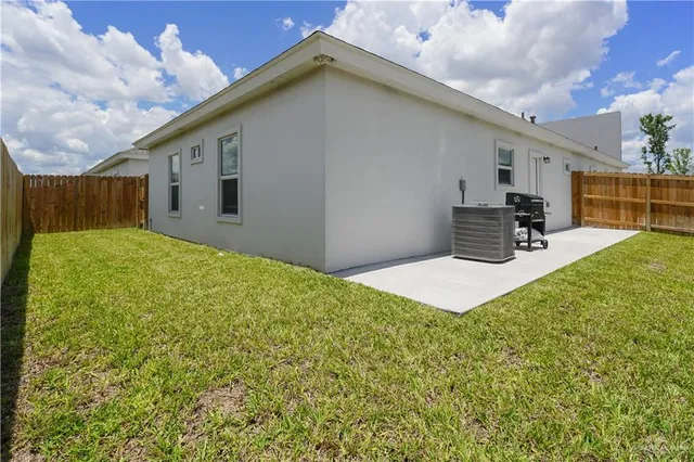 a house view with a backyard space