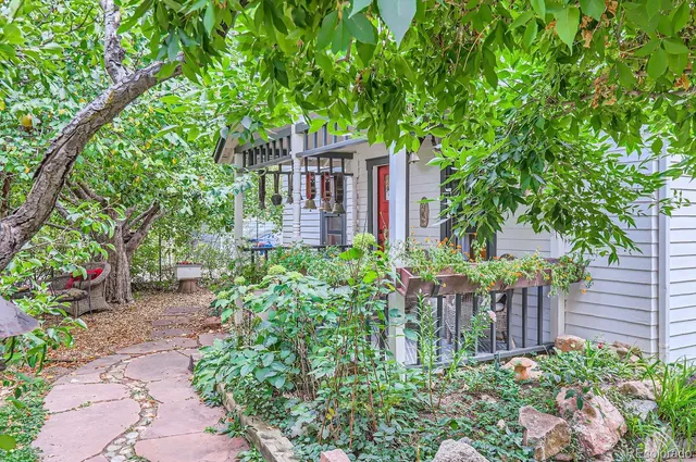 a couple of table and chairs in the garden